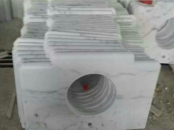 White marble vanity top with bullnose edge
