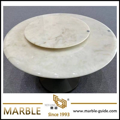 Taula rodona de marbre blanc